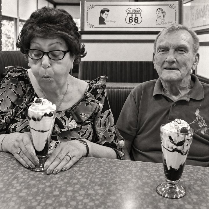 Our founder’s granny enjoying a sundae in a diner booth